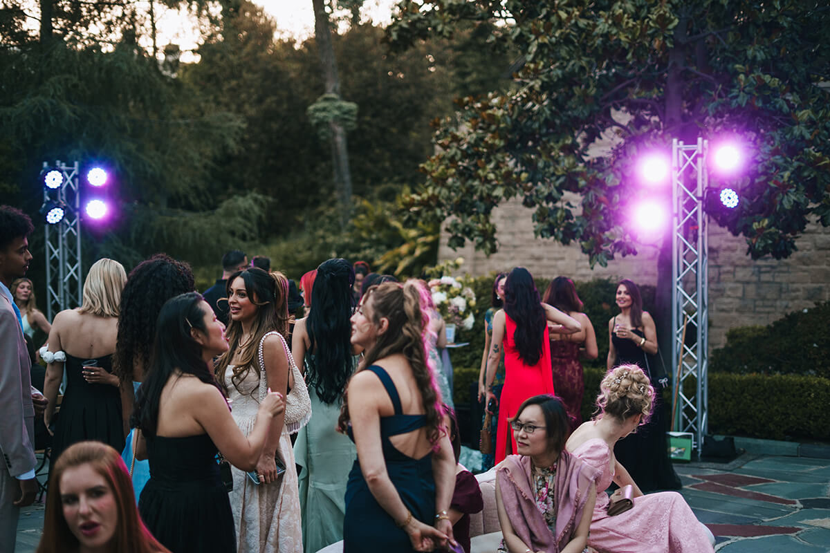Gathering of many people and purple lights
