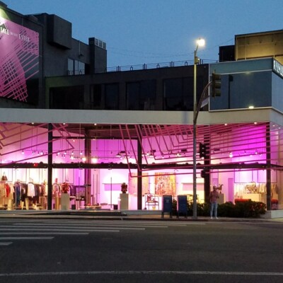 We have a growing array of fixtures and consoles. We can provide lighting for any event. Tell us about your needs and we will suggest the right lighting solution for your event. pink lighting on building